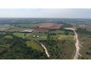 NORTH VIEW - SIGNIFICANT LAND & PRODUCING MINERALS AUCTION - 237 +/- SURFACE ACRES IN 4 TRACTS - 18 MINERAL PACKAGES IN GARVIN, MCCLAIN, GRADY & ROGER MILLS COUNTIES, OK - 6 Mo. AVG. CASH FLOW of $196,376/Mo.